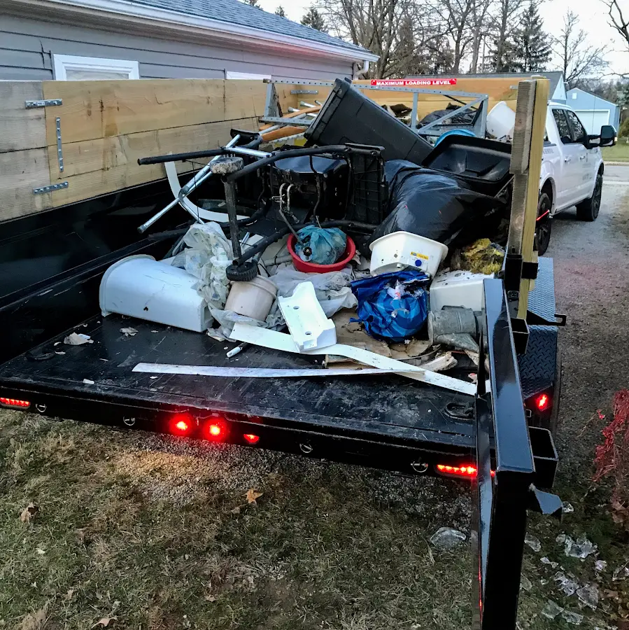 Roll-off dumpster delivered to a residential driveway in Springhill
